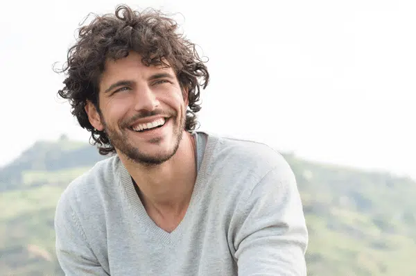 man-smiling-outside man-smiling-outside